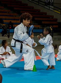 Young students practicing forms in unison